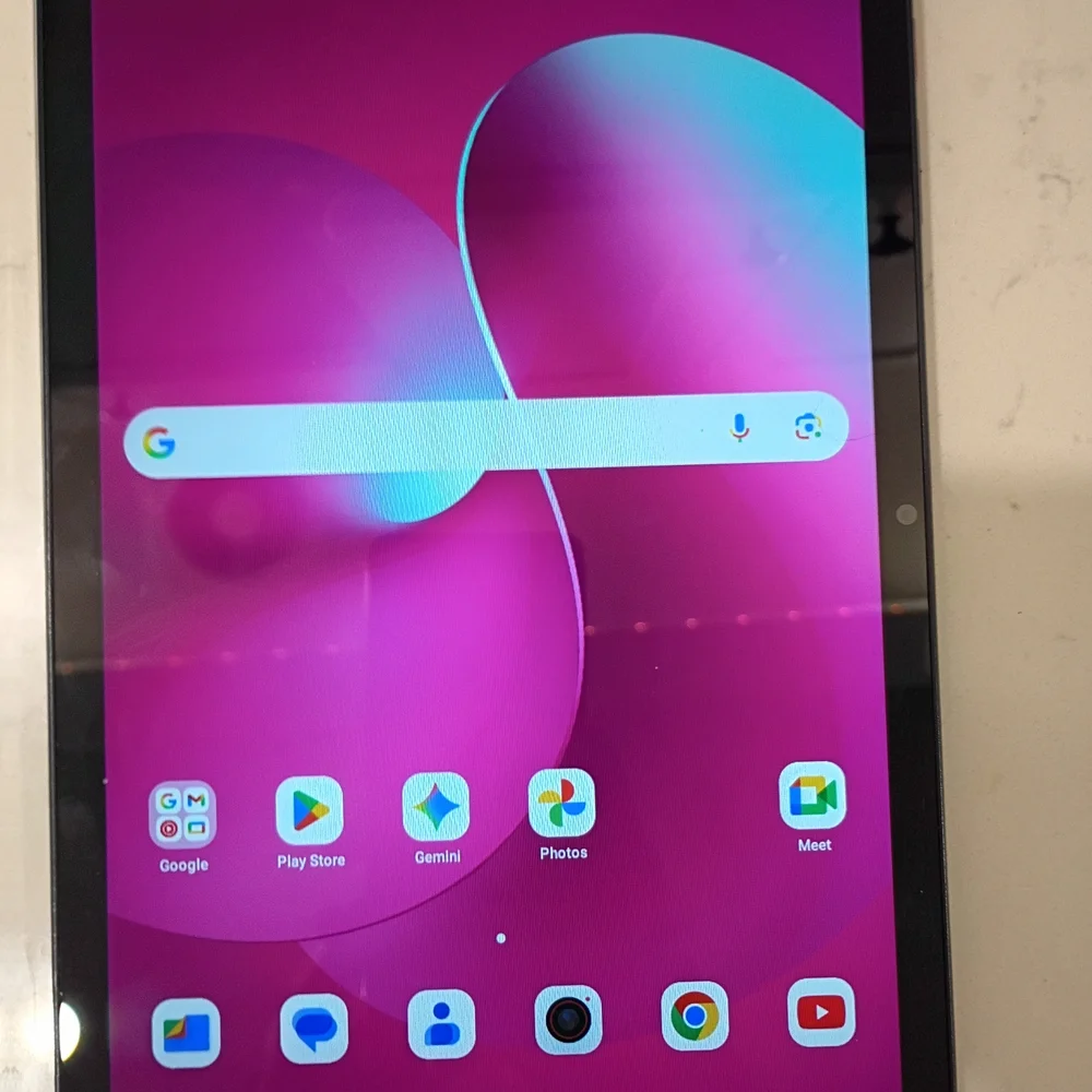 Sleek Black Tablet with Vibrant Pink Display